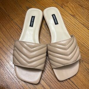 Nine West nude slides.